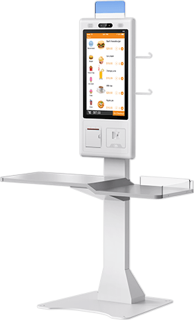 Retail self-checkout kiosk with a status light on top and a bagging shelf